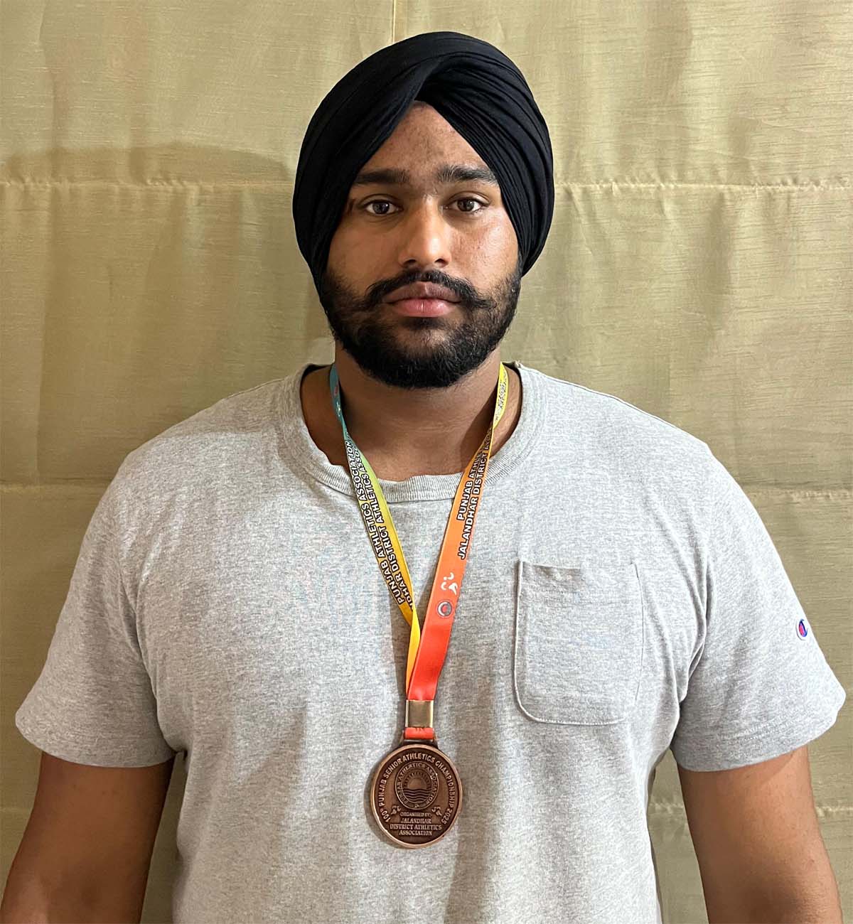 Birinder Pal Singh won bronze medal in shot put during State Athletics Championship.